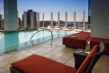 rooftop pool and lounge chairs at W Atlanta - Downtown