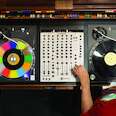 A DJ setup with two turntables seen from above 