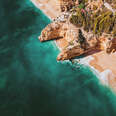 Amazing Drone Shot of Praia da Marinha, Praia do Buraco and Praia do Pau of the Beautiful Algarve Coastline near Benagil Caves, Portugal