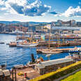 A beautiful harbor in Oslo filled with boats. 