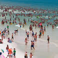 A packed beach in Pensacola, Florida